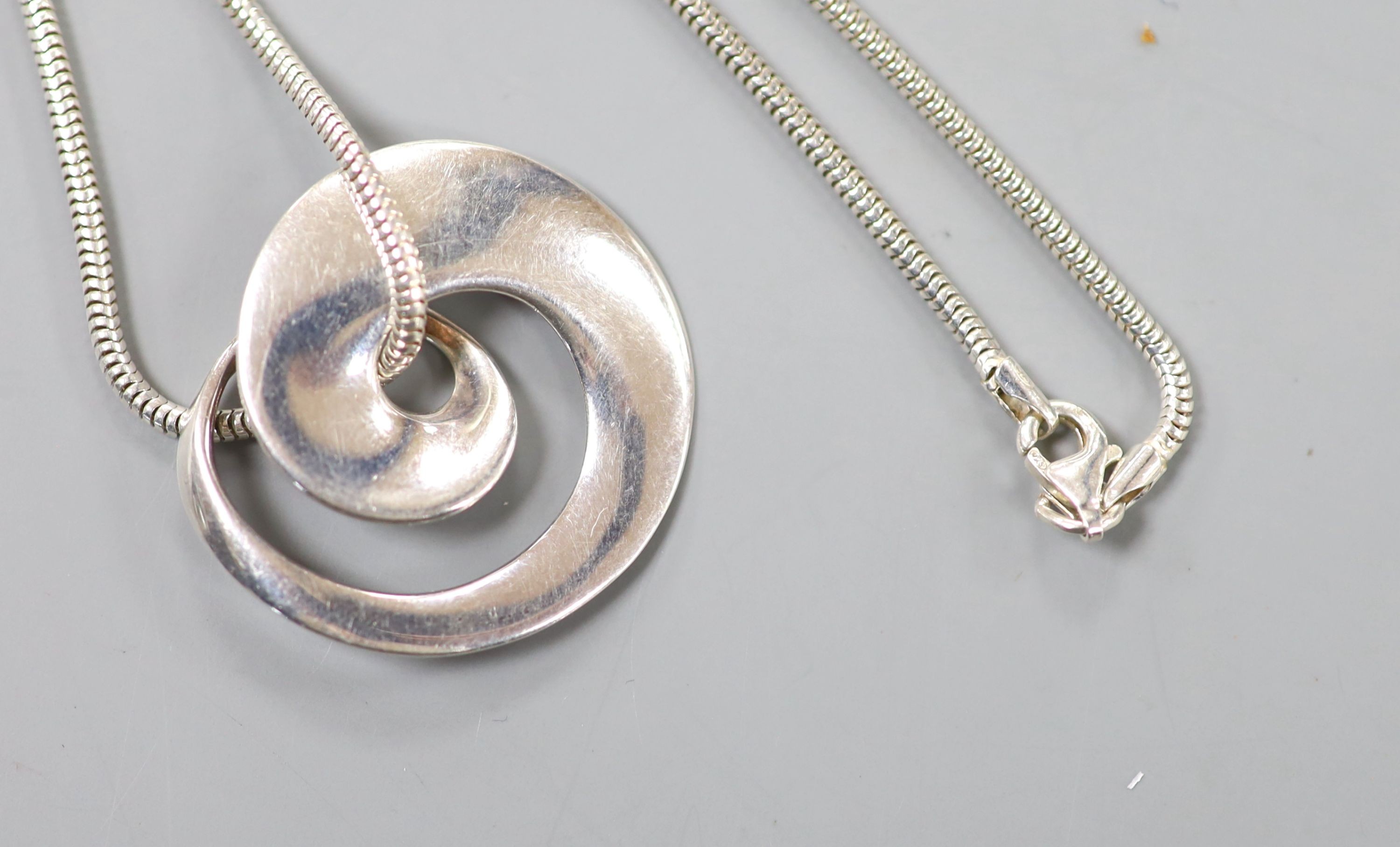 A Vivianna Torun for Georg Jenson sterling continuity pendant, no. 443, 29mm, on an associated silver chain, 40cm.